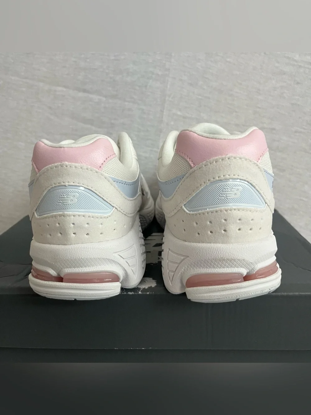 New Balance 2002 White Leather Sneakers with Pale Pink & Light Blue Accents